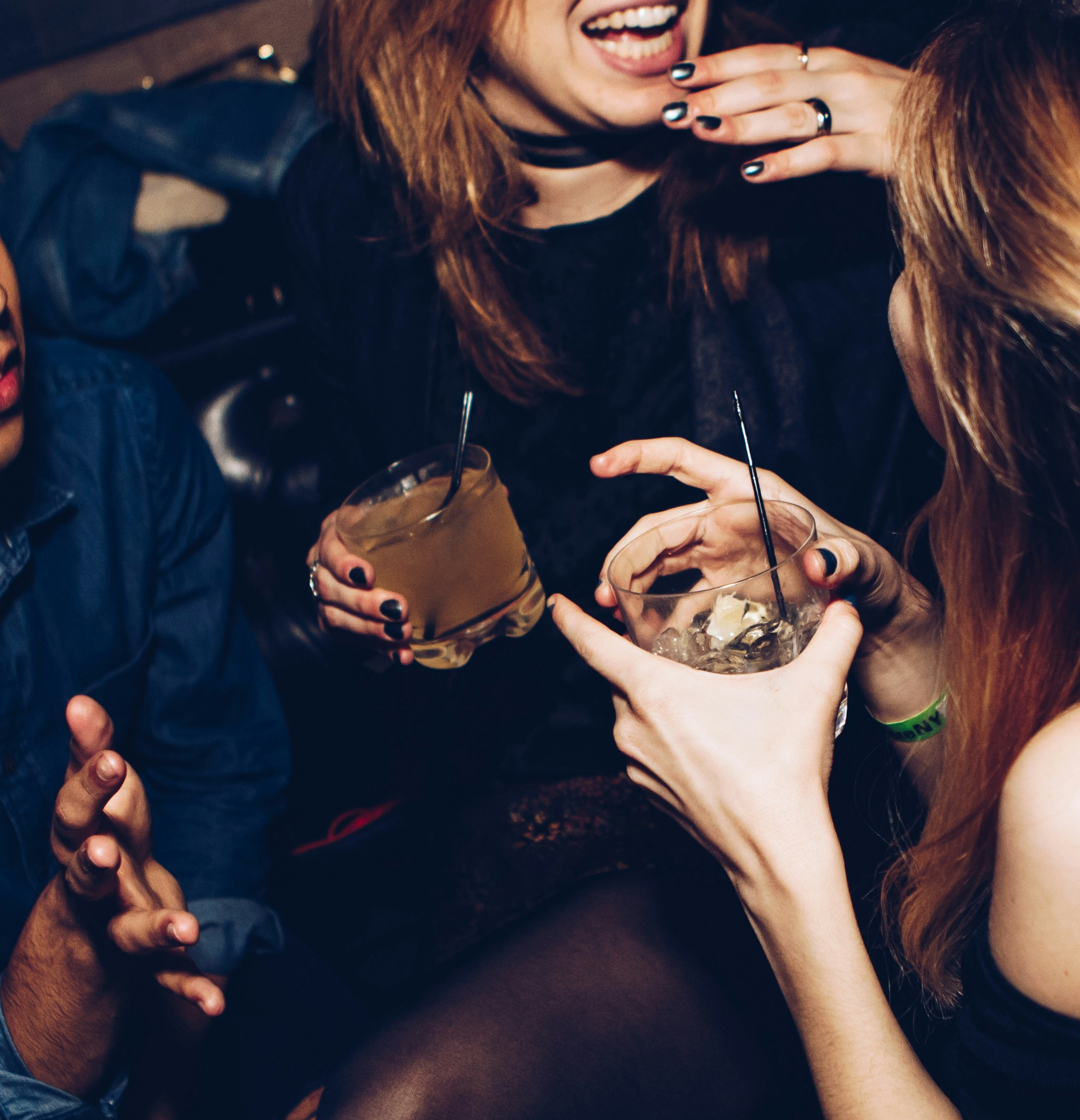 Friends enjoying drinks at a bar